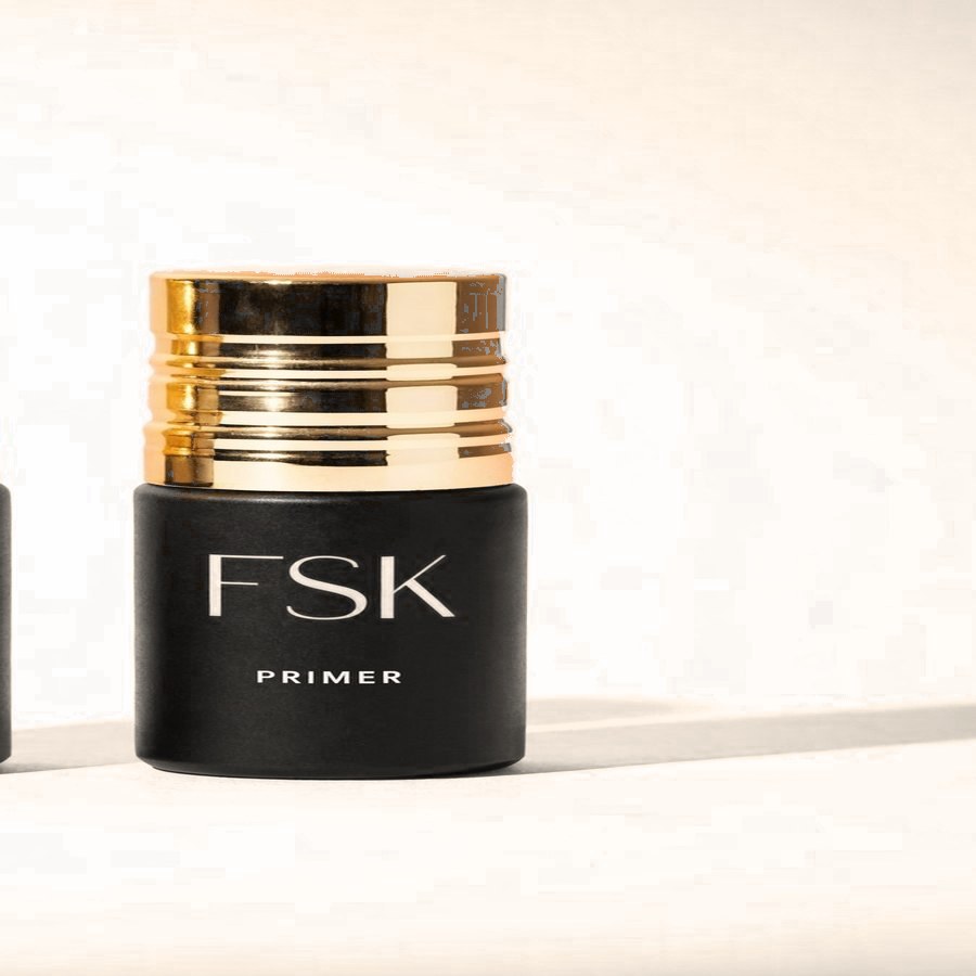 FSK Acid Primer, matte black bottle with a gold cap