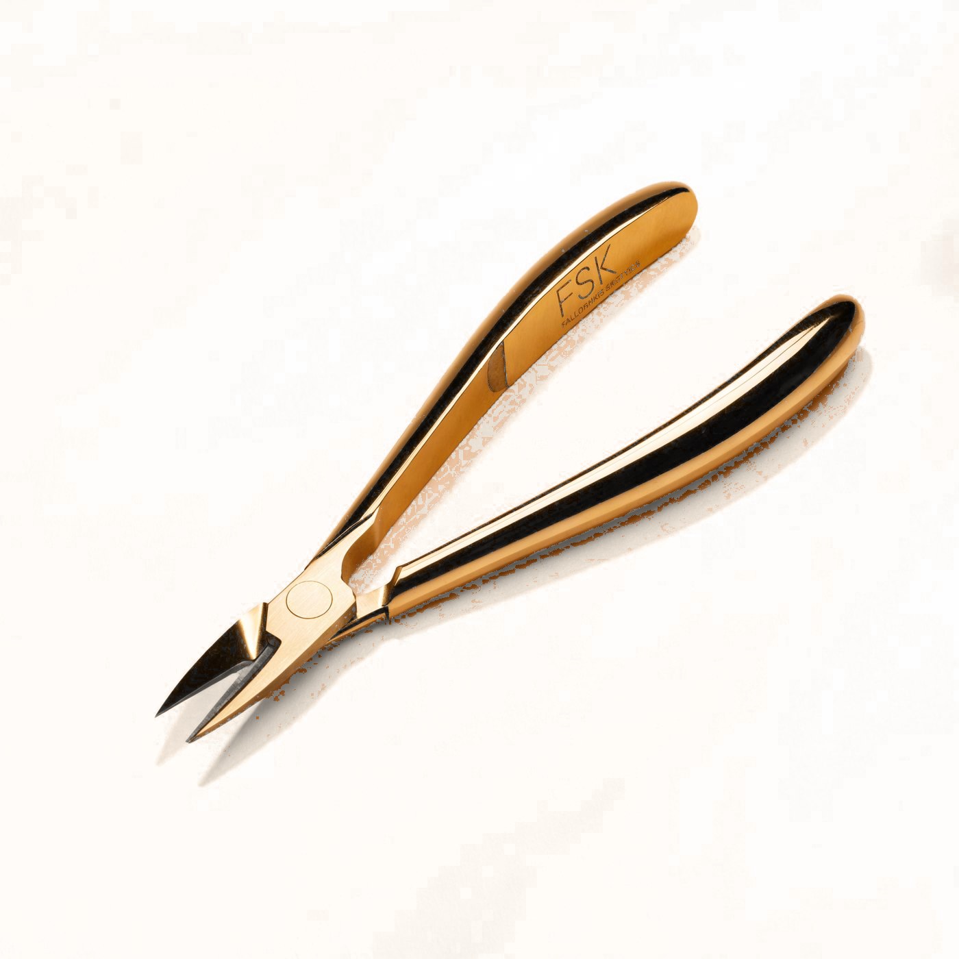 FSK gold cuticle cutters, engraved