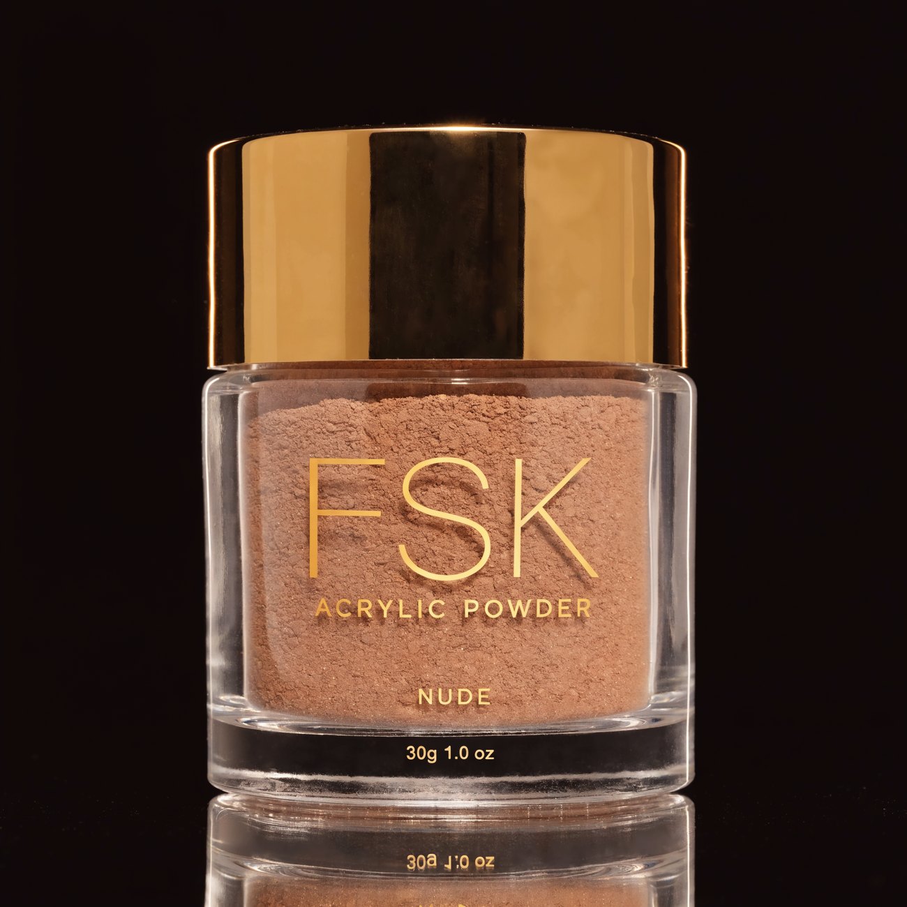 FSK Nude acrylic core powder in a clear jar with a gold lid