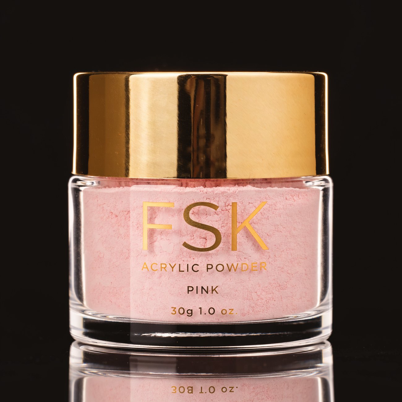 FSK Pink acrylic core powder in a clear jar with a gold lid